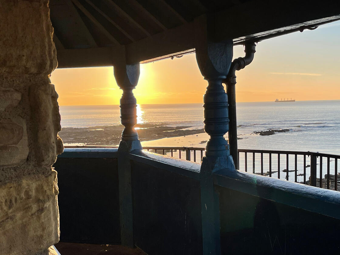 Veranda View of ocean from the veranda of the watch house with the sun rising