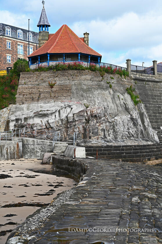 The Watch House on its cliff, taken from the North pier