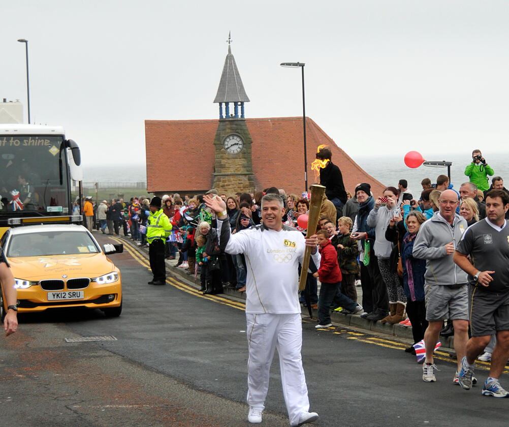 Olympic flame past the Watch House Olympic flame being carried past the Watch House in 2012