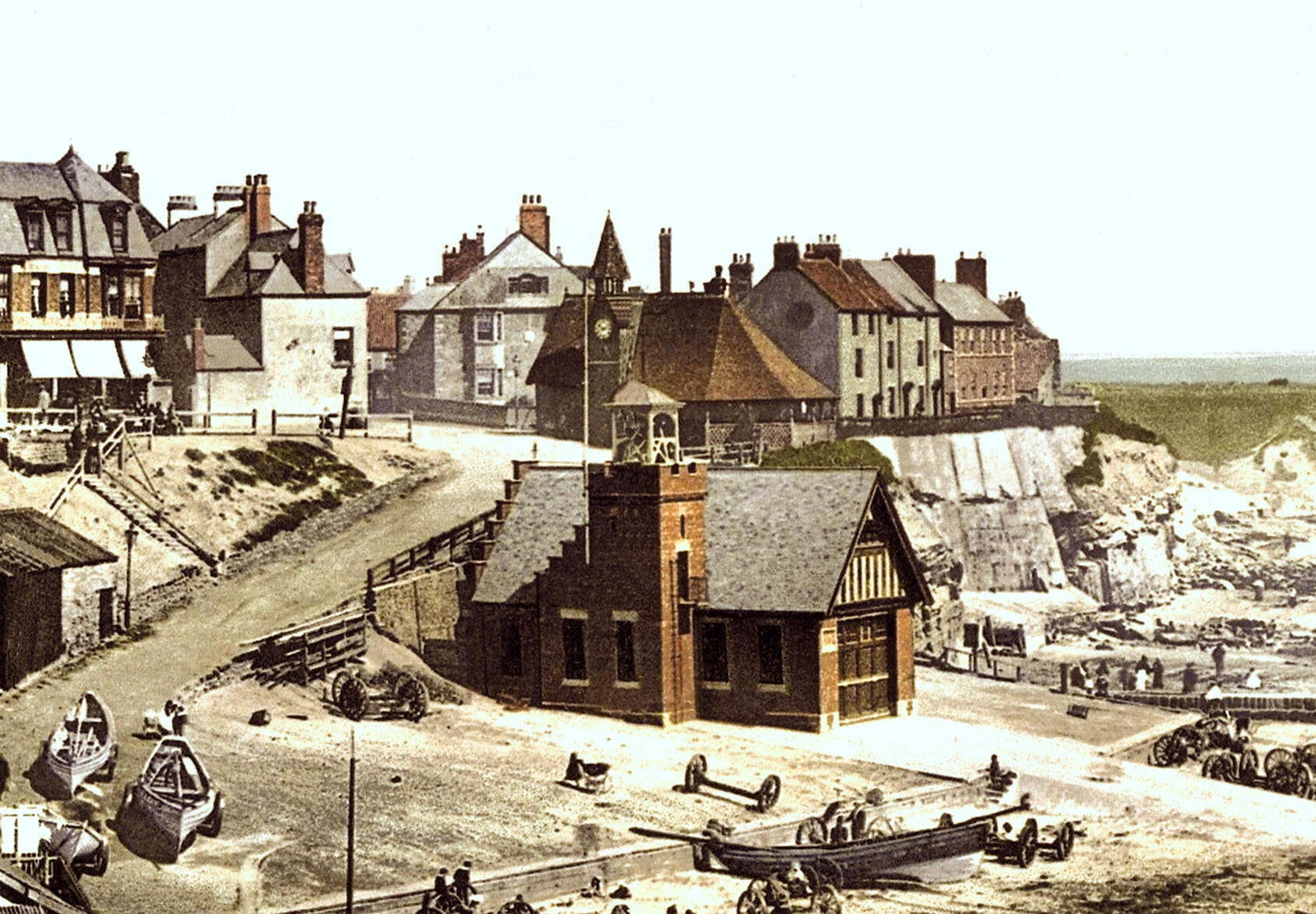 Vintage sepia picture of the Watch House, cottages behind, and RNLI Building